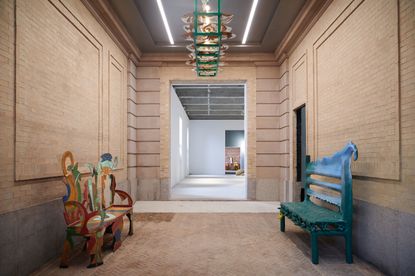 Salon 94’s rare porte-cochère entrance with Bronze Bench #3 (2003) and Chandelier (2004), by the late American artist Betty Woodman, and Bench (2021), by young Brooklyn artist Thomas Barger