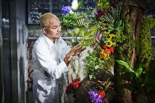 Azuma Makoto with floral sculpture