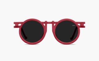 Sunglasses with red frame and black glass.