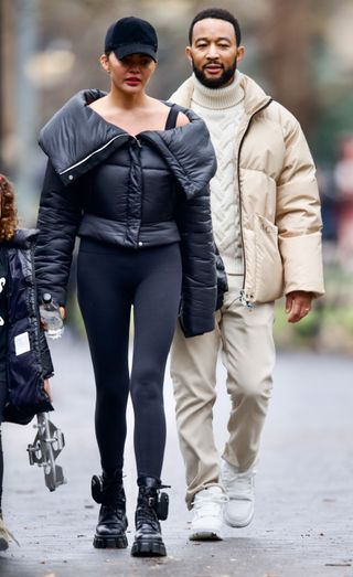 Chrissy Teigen and John Legend are seen on December 28, 2023 in New York City.