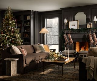 Dark living room with chritmas tree and fireplace