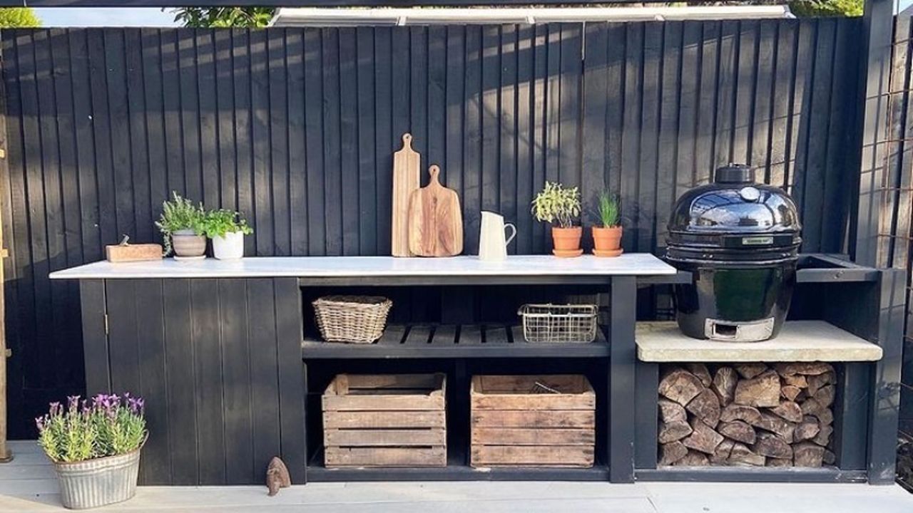 blue outdoor kitchen and pergola