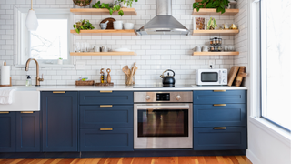 Kitchen with navy blue cupboards