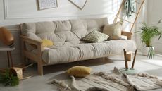 A living room looks disheveled after an earthquake.