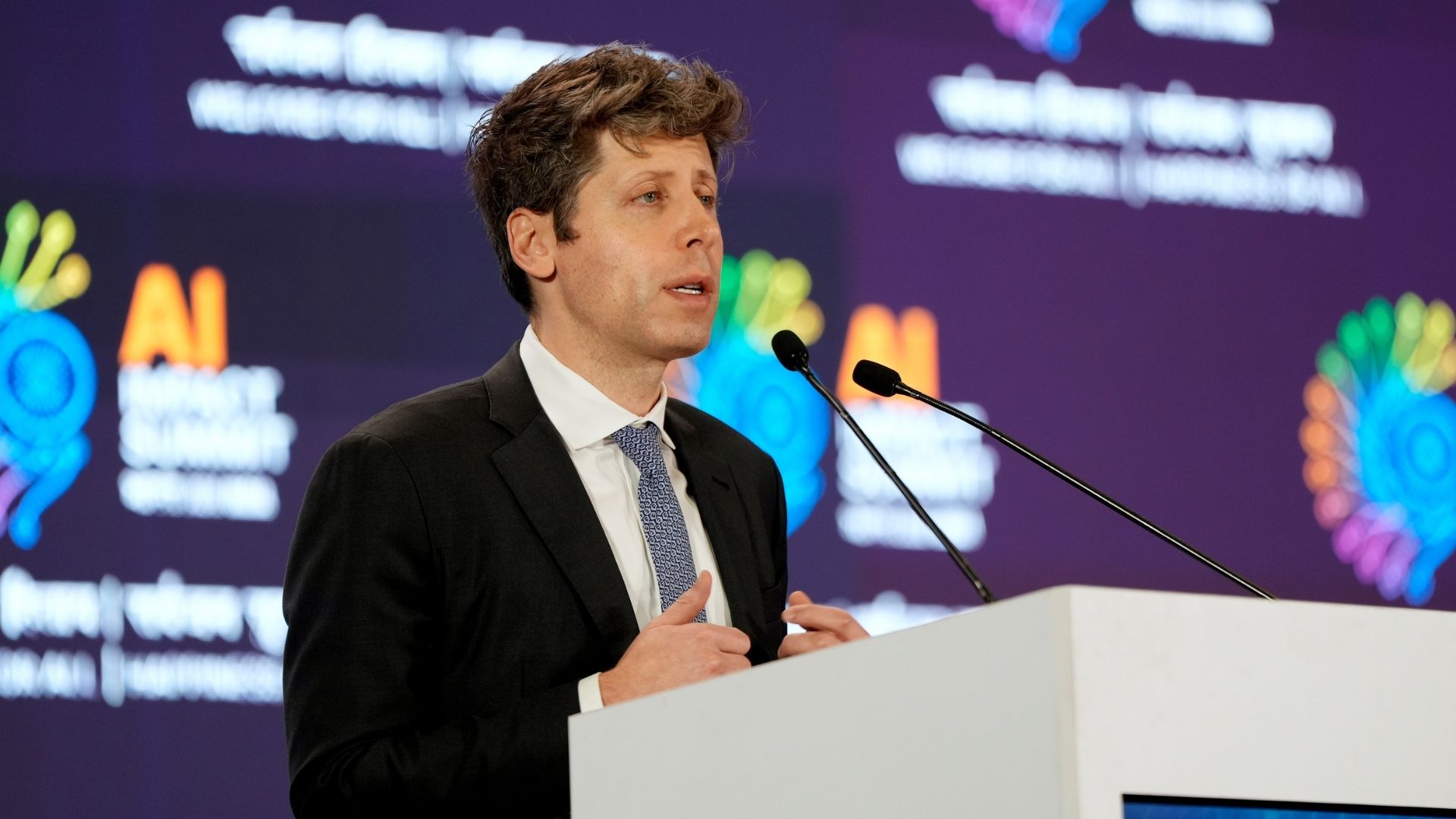 Sam Altman speaking at the India AI Impact Summit in February 2026