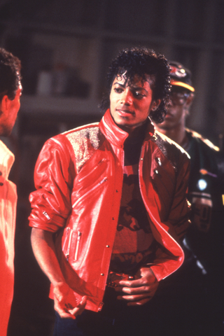 1980s Fashion: Michael Jackson wearing a red jacket on the set of his Thriller music video
