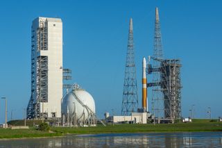 Delta IV rocket stands poised to launch AFSPC-6 military satellites.