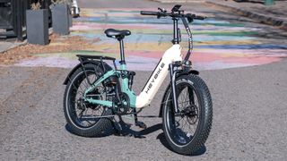 HeyBike Horizon electric bike parked on a colorful street