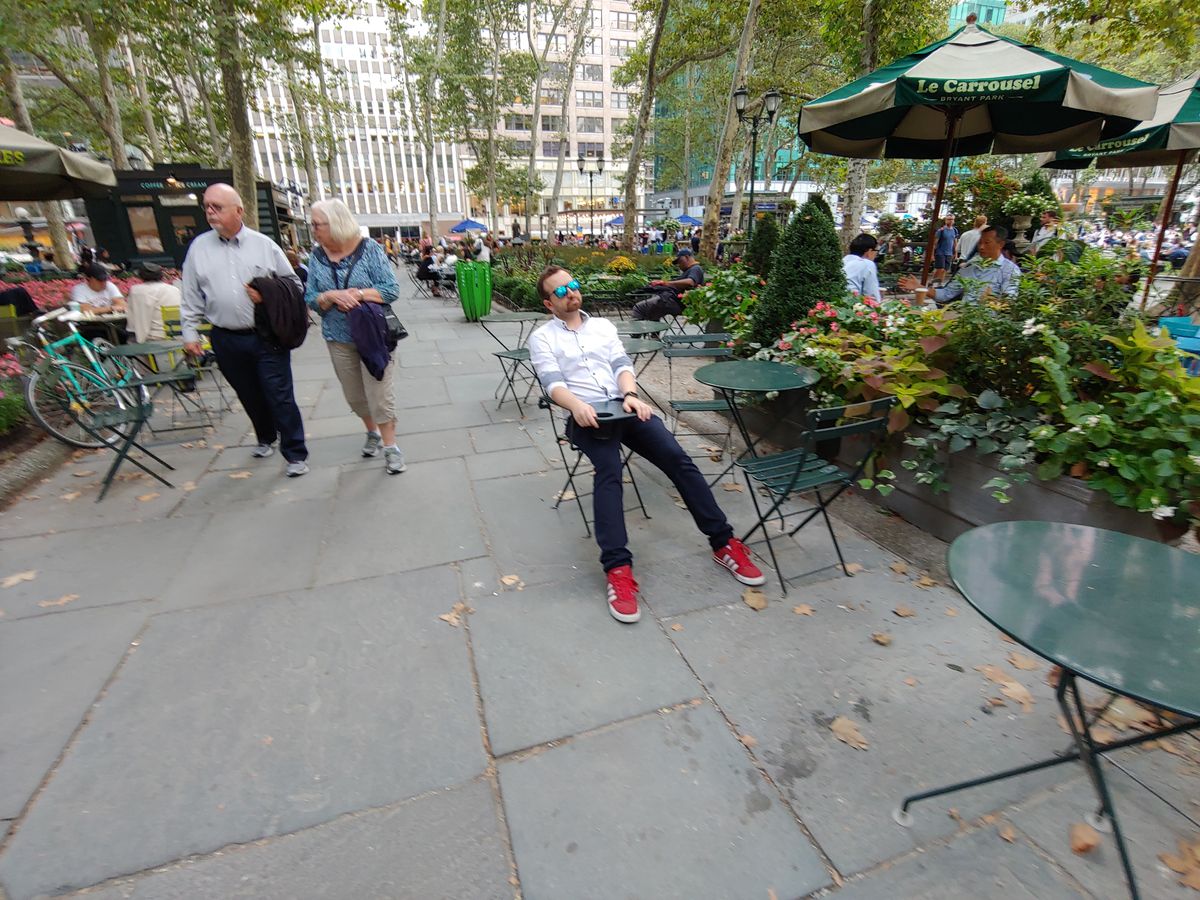 Notice that the edges aren't sharp and even blurry in some areas, especially if you look closely at the people on the left and green table on the right