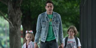 The King of Staten Island Pete Davidson walking two kids home from school