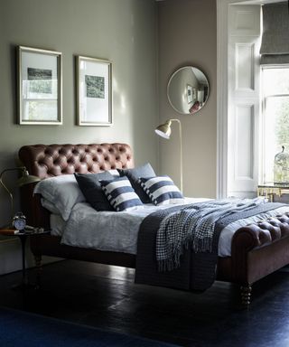 Brown bed with chesterfield style headboard by Soft dot com