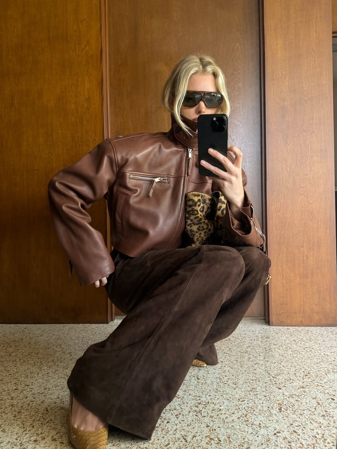 woman wearing oversize sunglasses outfit 2026