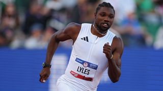 Noah Lyles of Team USA runs the 200m all in white ahead of the 2024 Paris Olympic athletics. 