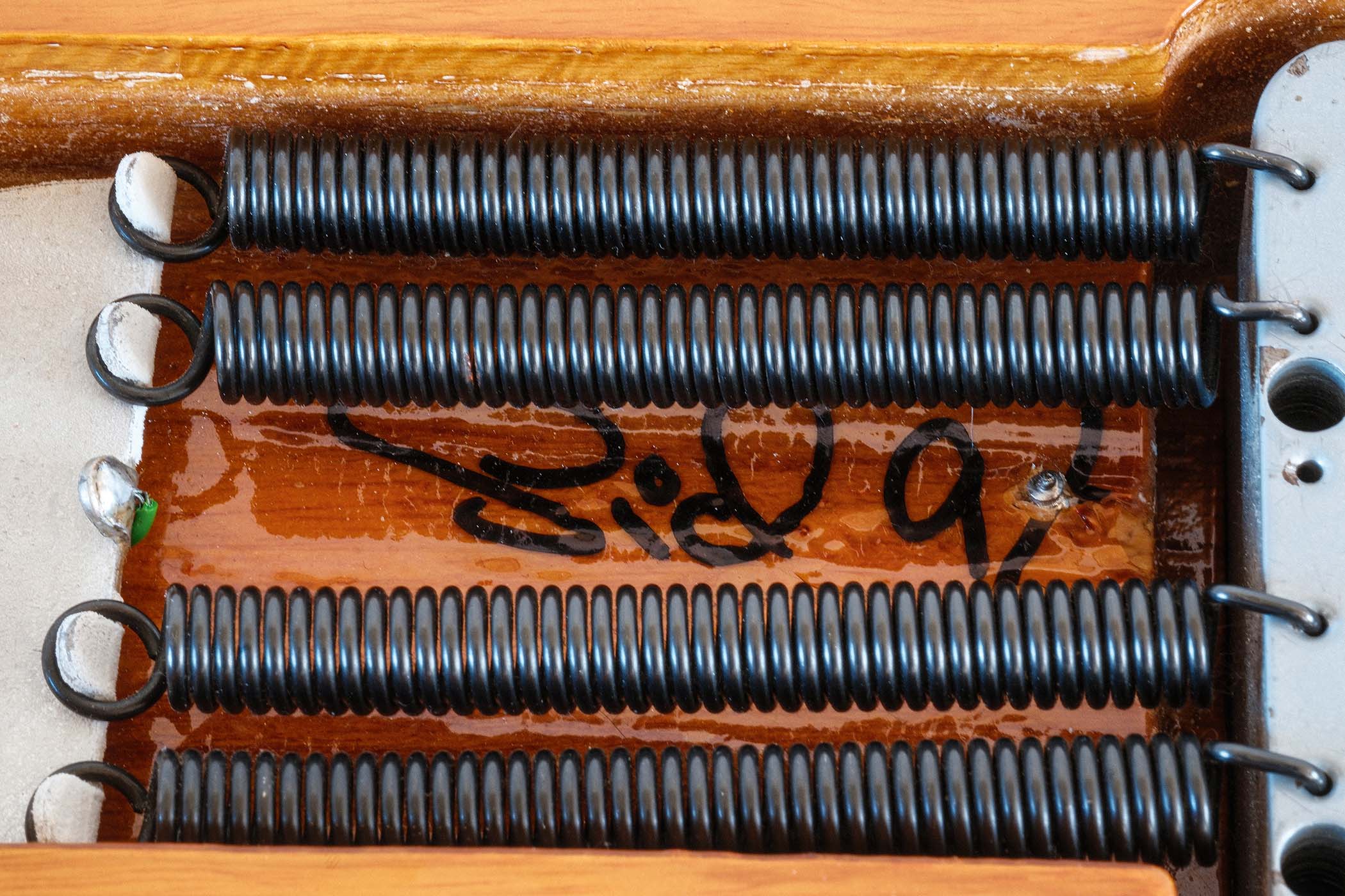 The original parts-build was carried out by the late, great luthier Sid Poole, who very often liked to sign his work