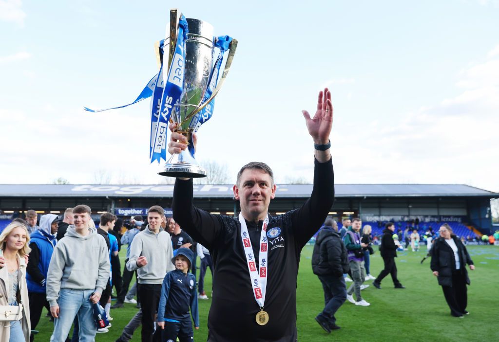 The teams and officials walk out onto the pitch prior to the Emirates FA Cup First Round Replay match between Forest Green Rovers and Scarborough Athletic at The New Lawn on November 14, 2023 in Nailsworth, England. (Photo by Michael Steele/Getty Images)