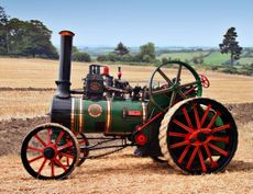 A traction engine in a field