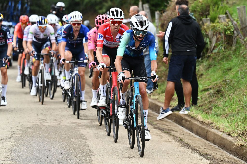 LAGOS DE COVADONGA SPAIN SEPTEMBER 03 LR Ben OConnor of Australia Red Leader Jersey and Valentin ParetPeintre of France and Team Decathlon AG2R La Mondiale compete during the La Vuelta 79th Tour of Spain 2024 Stage 16 a 1815km stage Luanco to Lagos de Covadonga 1069m UCIWT on September 03 2024 in Lagos de Covadonga Spain Photo by Tim de WaeleGetty Images
