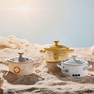 golden and white mini cocotte with sand
