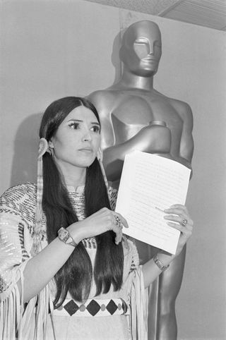 Most controversial Oscars moments: Apache activist Sacheen Littlefeather speaks after rejecting the Academy Award in place of Best Actor winner Marlon Brando.