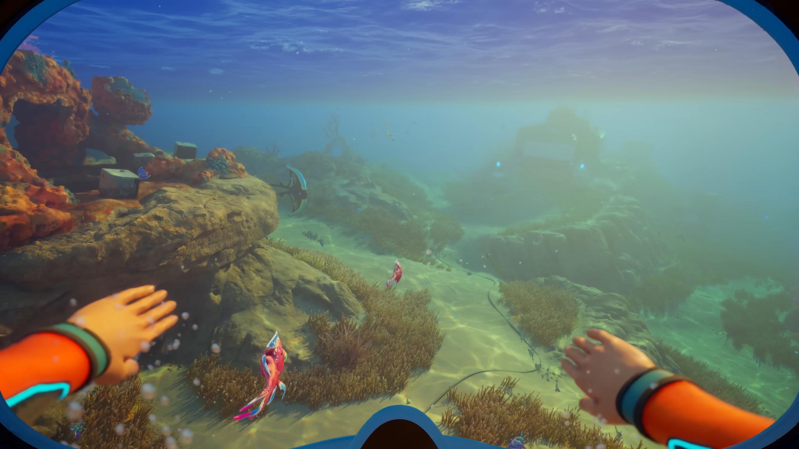 Subnautica 2 Wakemaker: A character wearing an orange swimsuit swimming through the ocean.