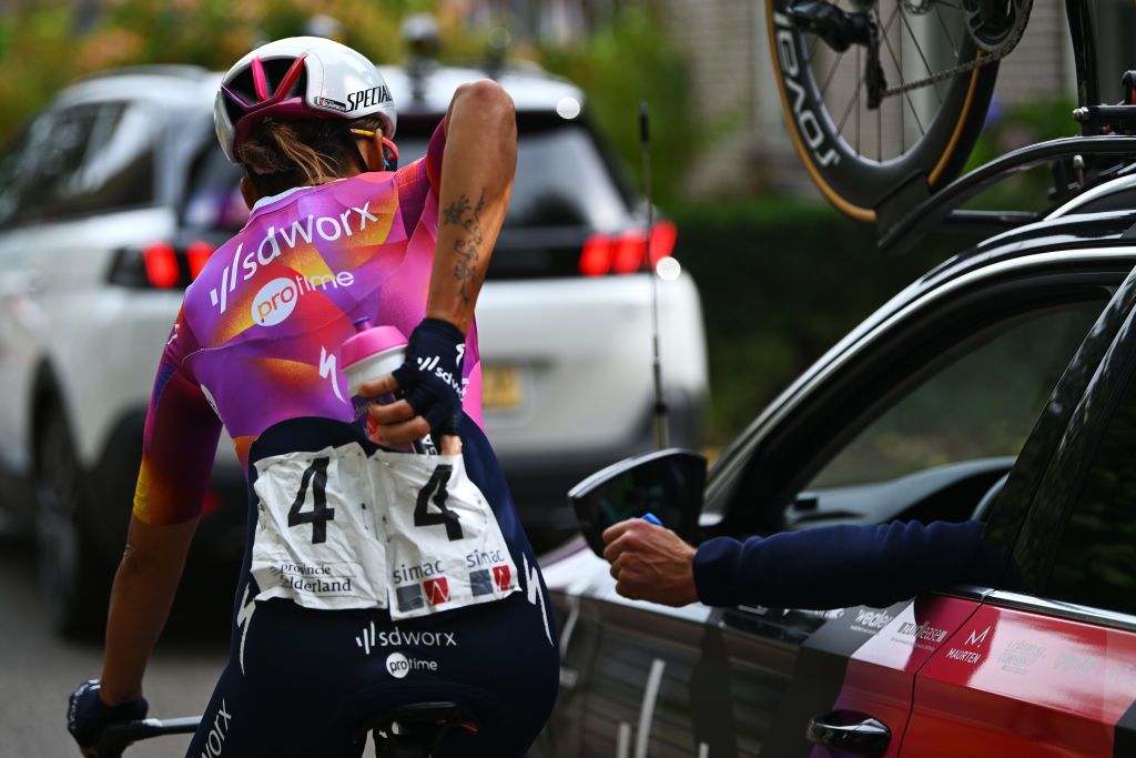 ASSEN NETHERLANDS OCTOBER 09 Barbara Guarischi of Italy and Team SD Worx Protime competes in the feeding area during the 26th Simac Ladies Tour 2024 Stage 2 a 1548km stage from Coevorden to Assen on October 09 2024 in Assen Netherlands Photo by Luc ClaessenGetty Images
