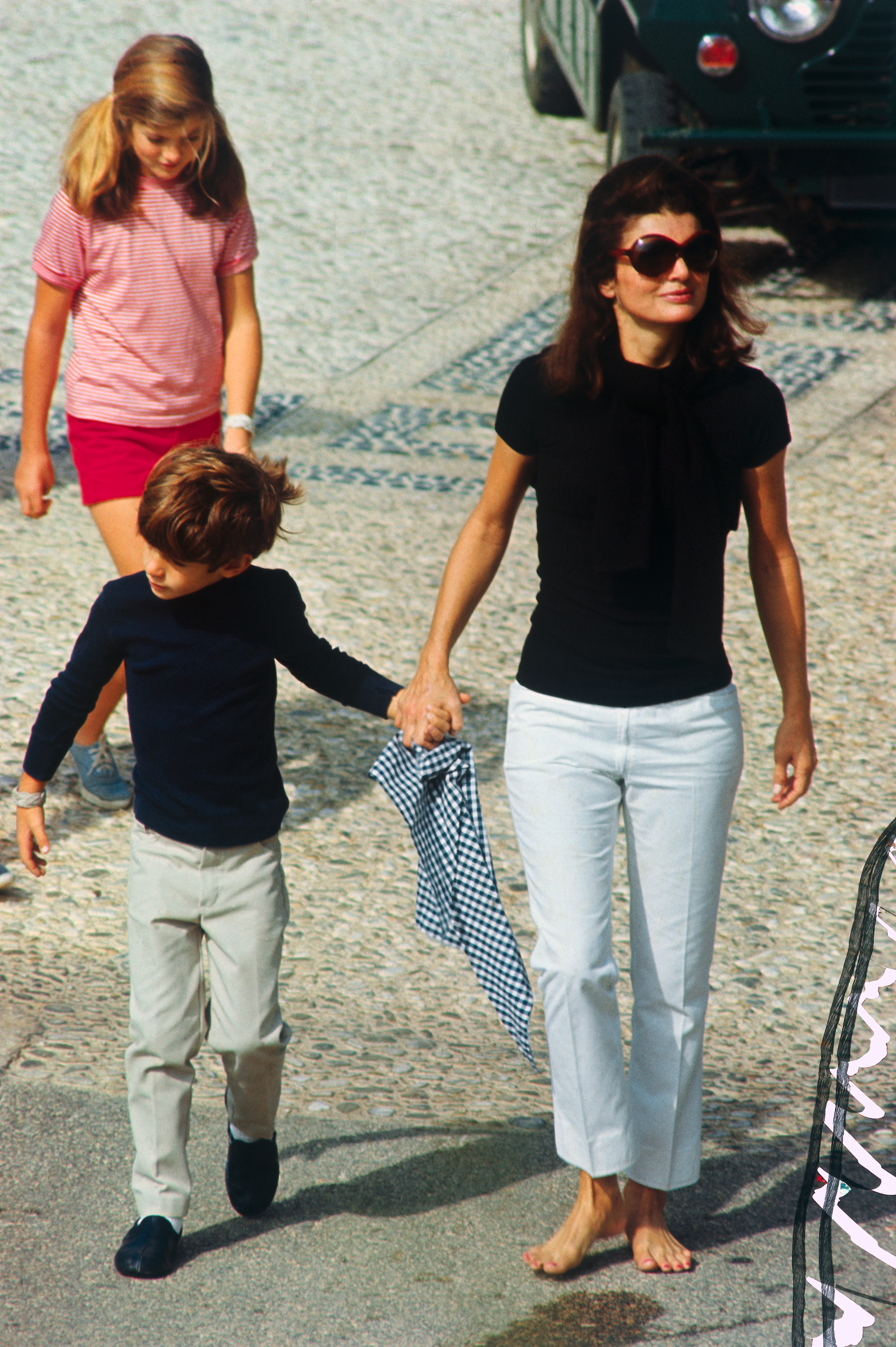Jackie Kennedy Onassis in different late '60s
 and '70s-era summer staples.