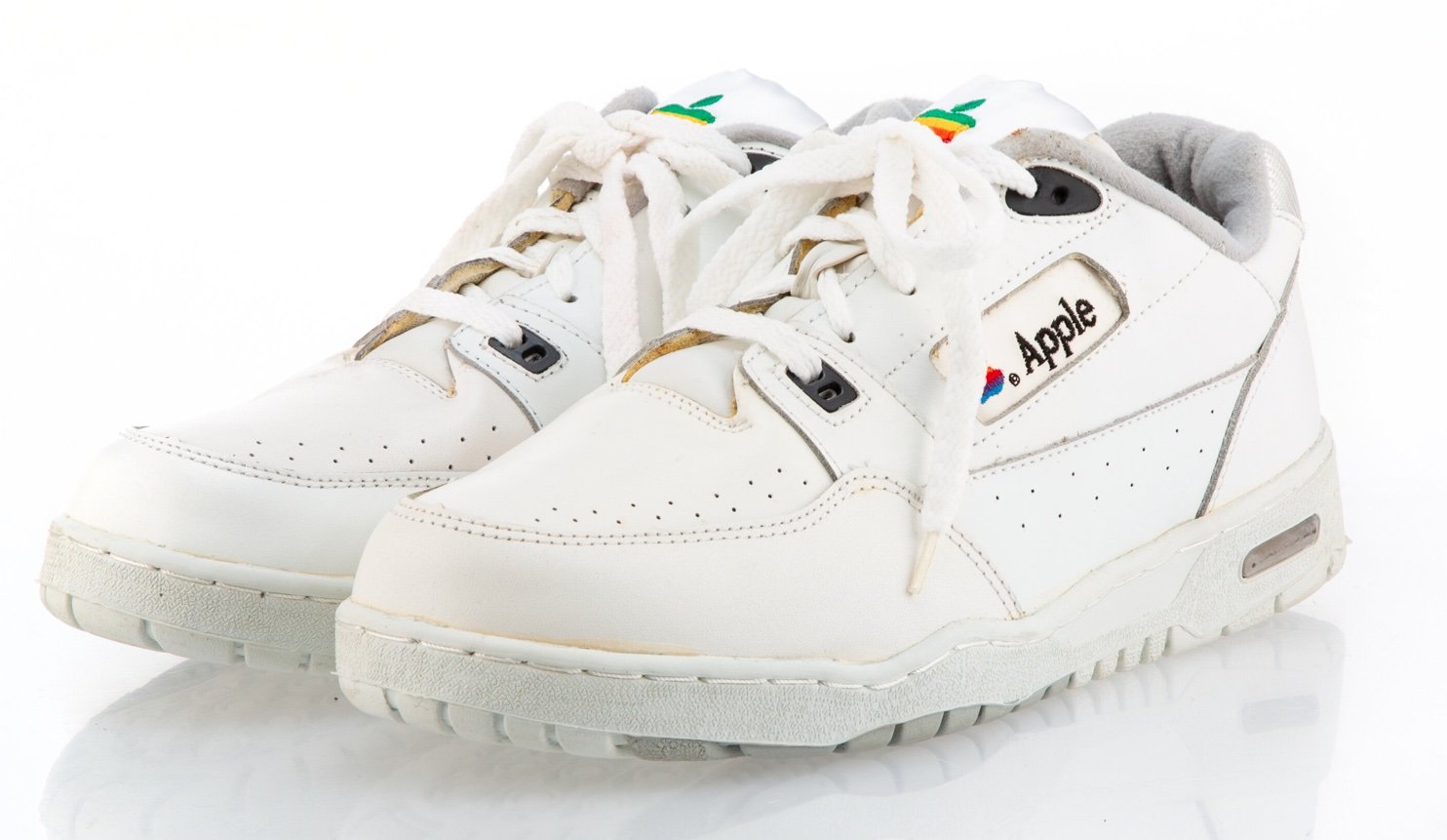 Represent with a pair of rare Apple sneakers from the 1990s 