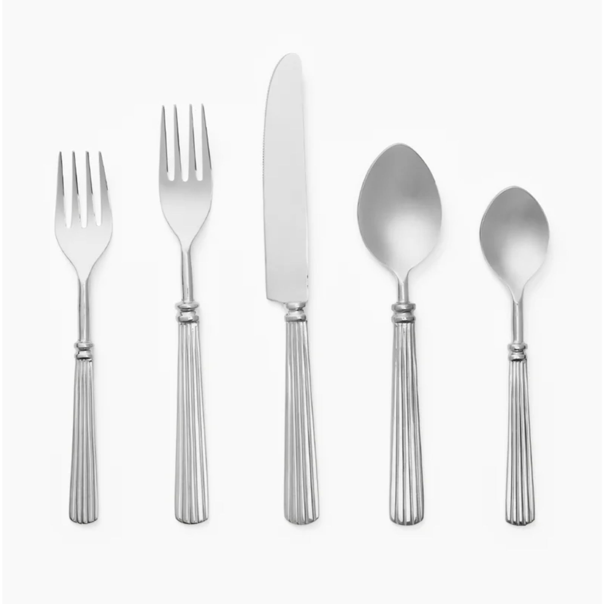 Silver five-piece flatware set with ribbed handles