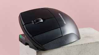 Side view of Contour Design Unimouse on plinth with pink background