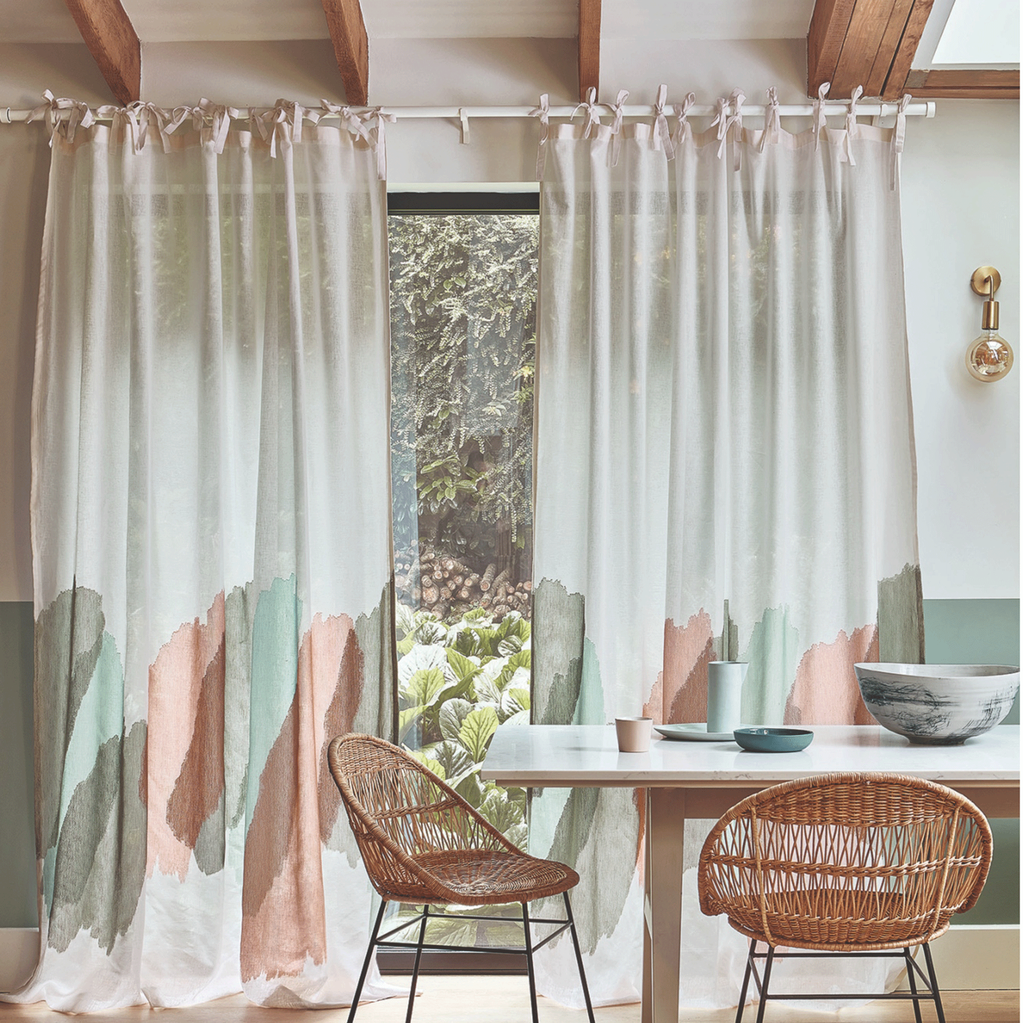 Green and pink curtains in dining room