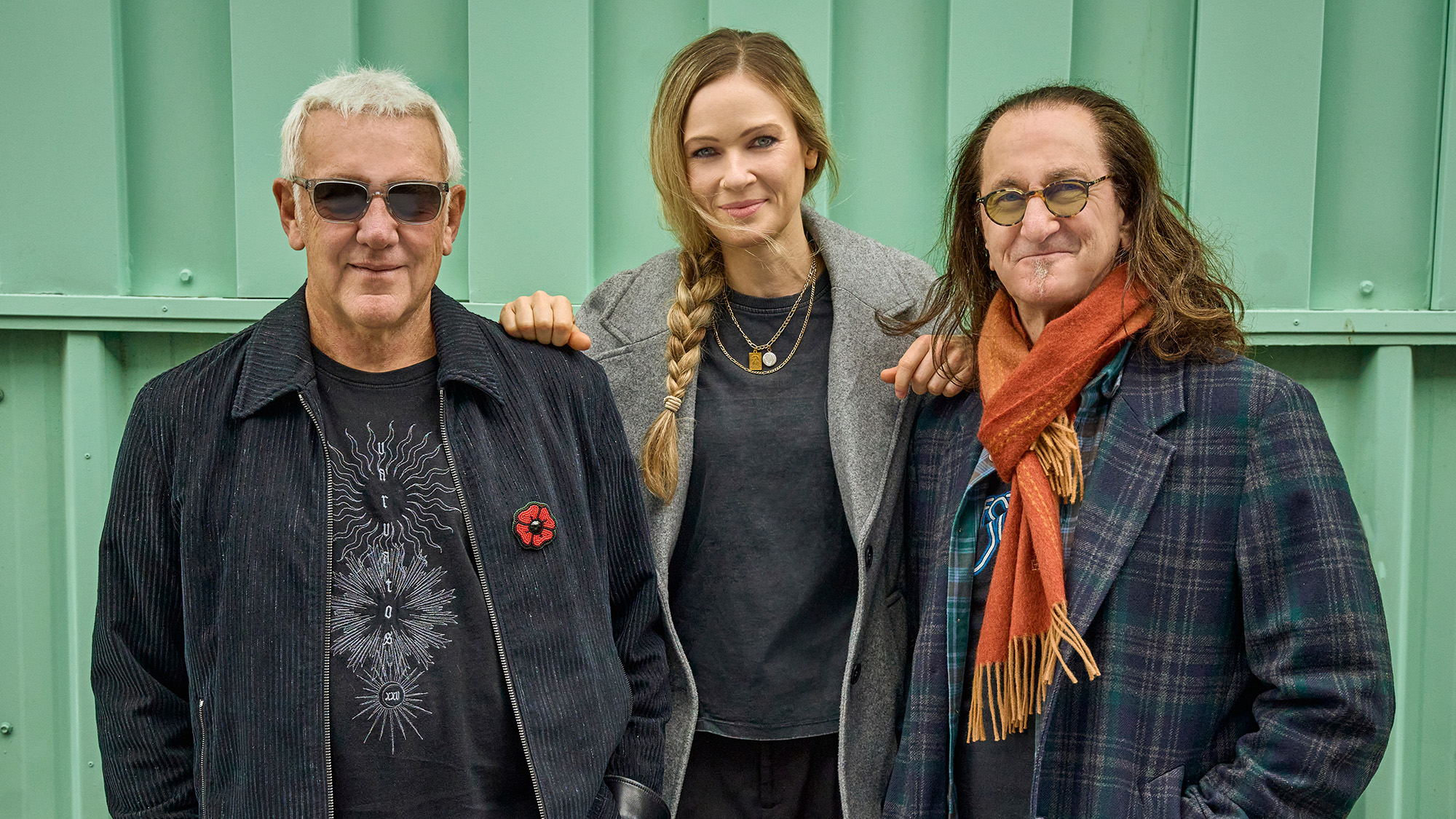 Rush (L-R): Alex Lifeson, Anika Nilles, Geddy Lee