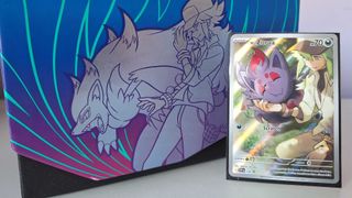 Pokemon Journey Together Elite Trainer Box with a card standing beside it