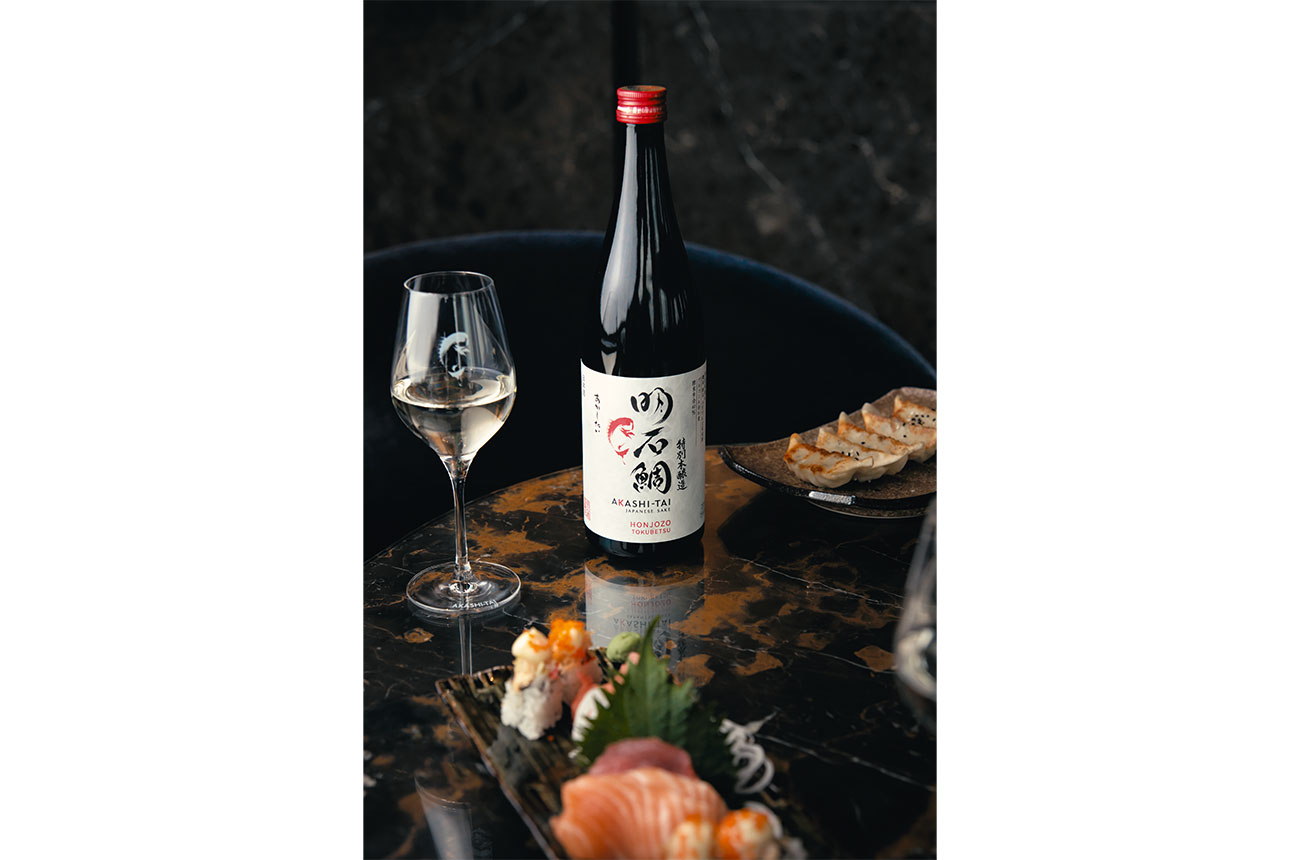 Bottle of Akashi-Tai Honjozo Tokubetsu with food