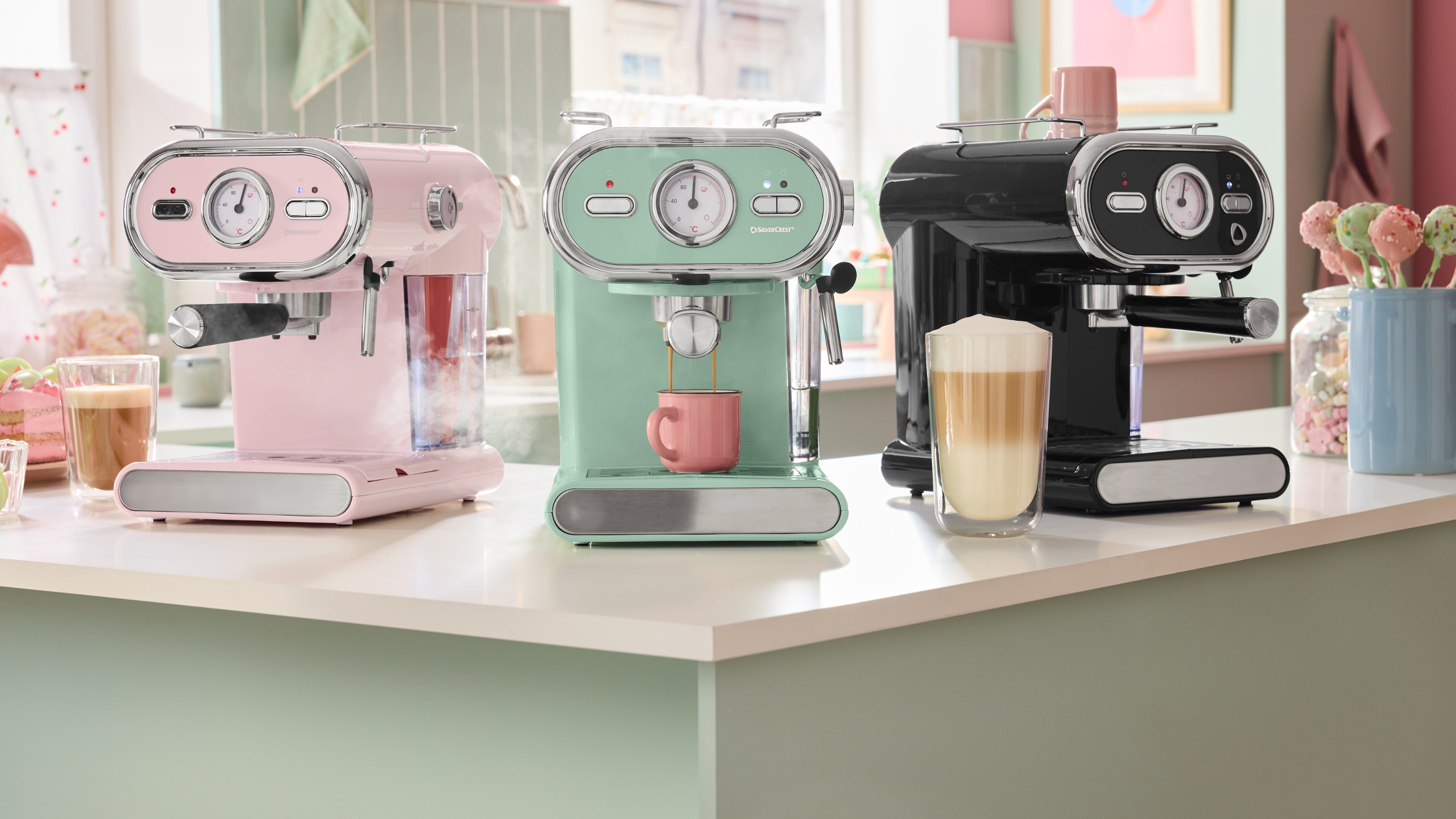 Lidl espresso machine in mint, pink and black in pastel kitchen.