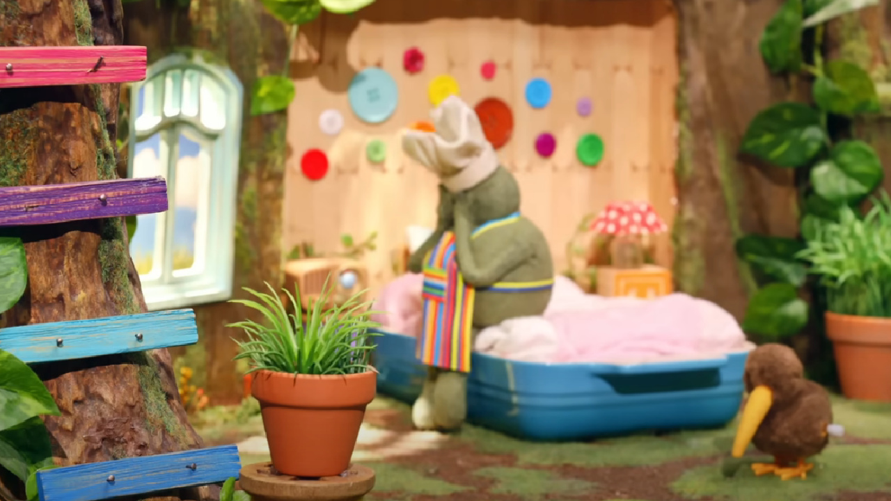 Tiny Chef crying on his bed.