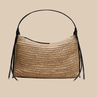 Flat lay image of straw handbag