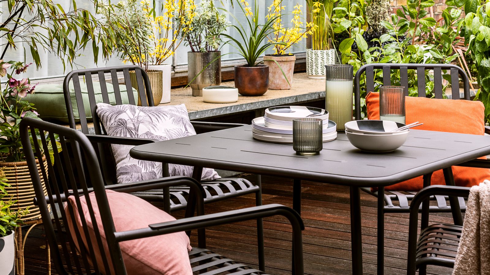 How to arrange outdoor furniture for small garden socialising Ideal Home
