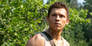 Tom Holland as Todd Hewitt in Chaos Walking movie looking off to the distance
