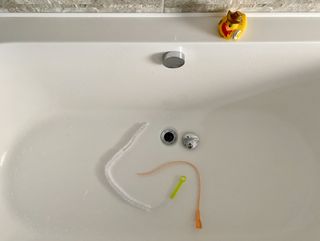 bath drain with hair snake and pipe cleaner