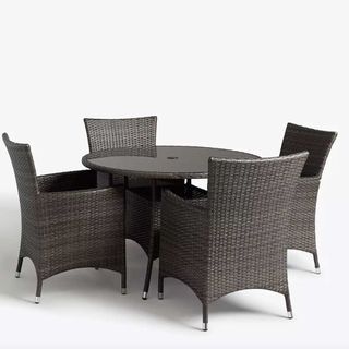 brown rattan garden dining table with 4 chairs and glass top table