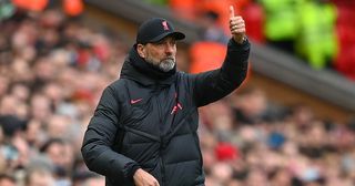 Liverpool manager Jurgen Klopp reacts during the Premier League match between Liverpool FC and Manchester United at Anfield on March 05, 2023 in Liverpool, England.