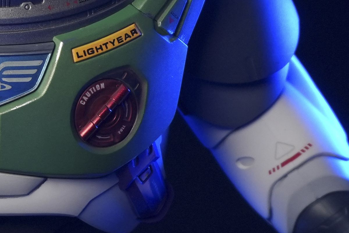 Sony ZV-E10 II sample images of buzz lightyear toy in dark studio taken at different ISO settings