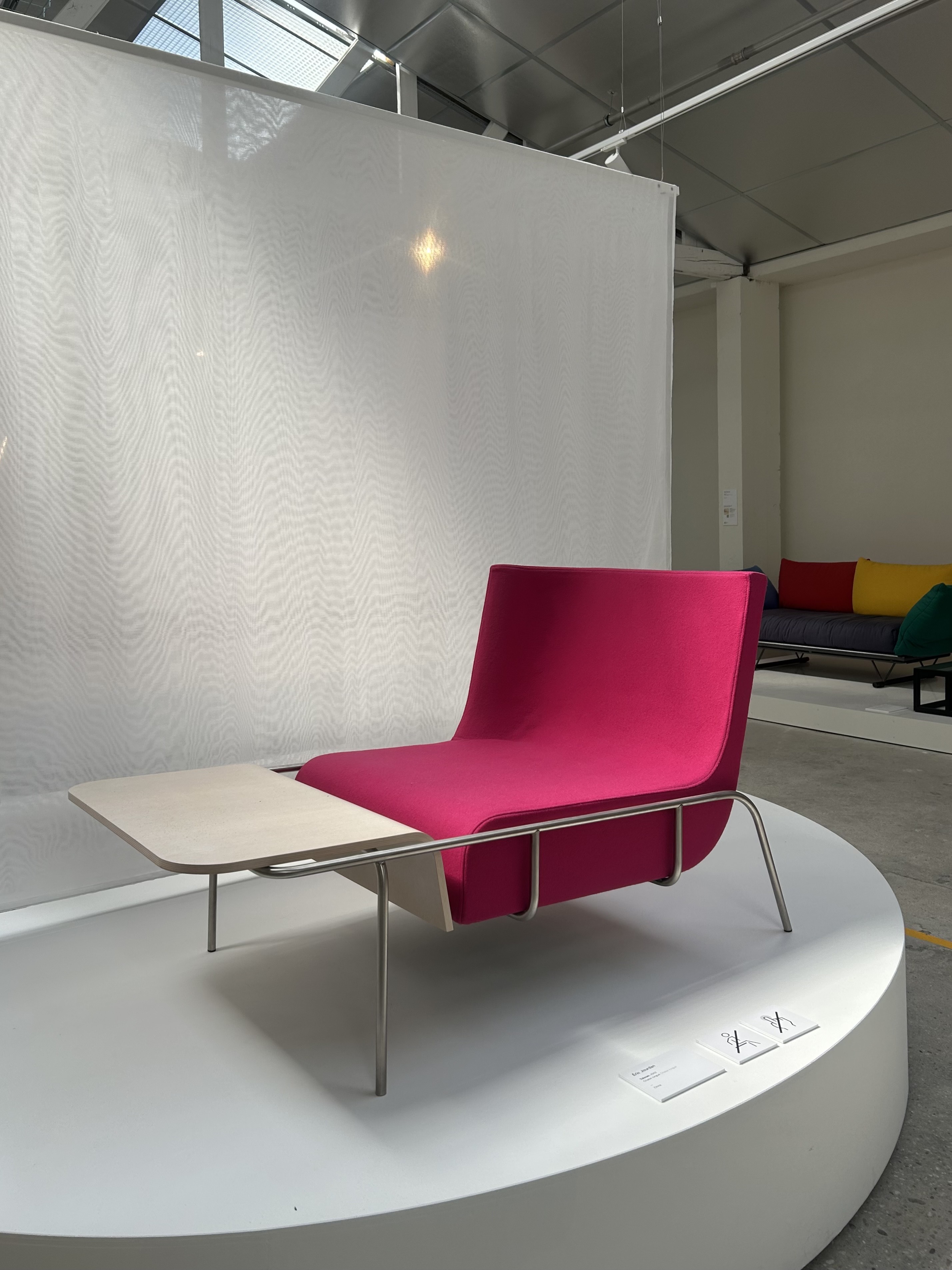 Tolozan by Eric Jourdan 2002 lounge chair with an integrated side table displayed at Studio 1860