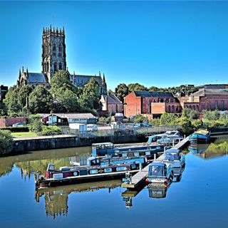 Properties along a canal with boats