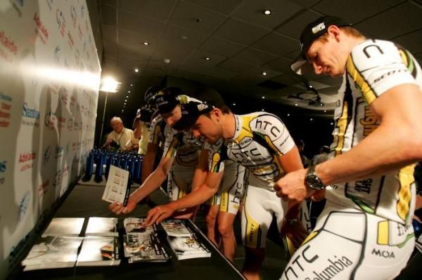 Even the riders were keen to check out their own cards at HTC-Columbia's launch.