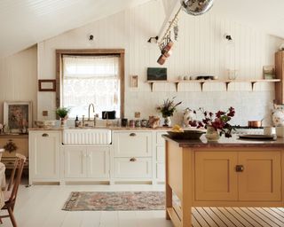 White kitchen with yellow island