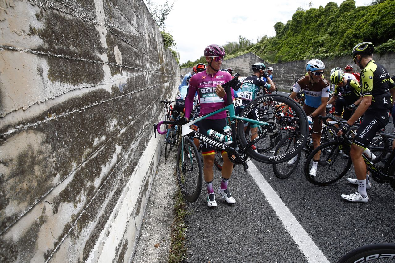 Pascal Ackermann (Bora-Hansgrohe) tries to find a way through the riders