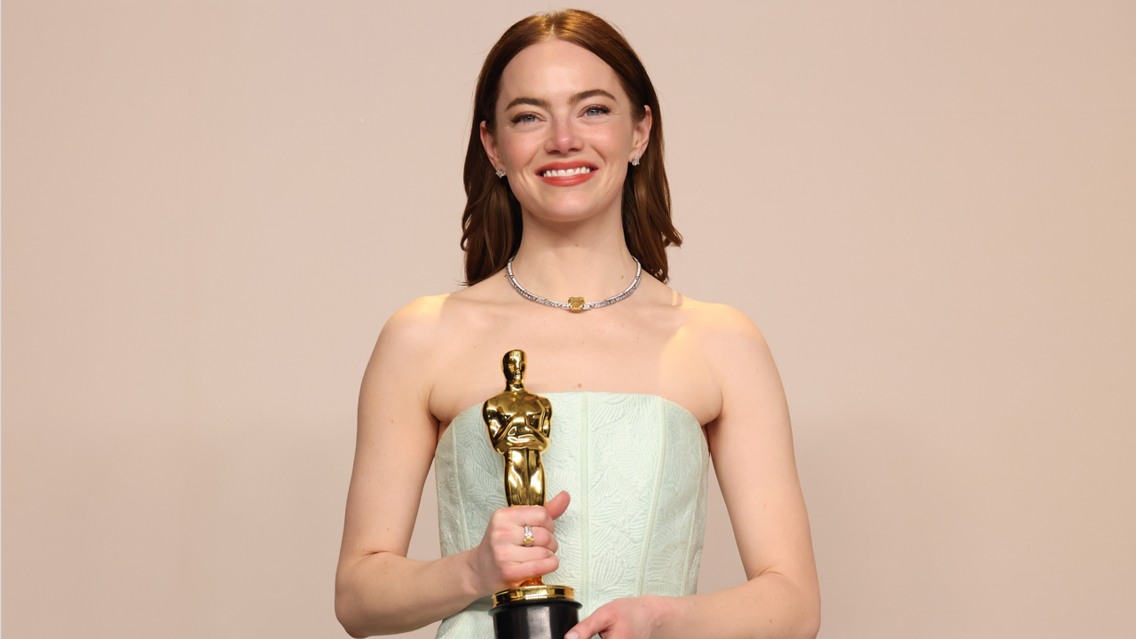  Emma Stone accepts the Lead Actress award for &quot;Poor Things&quot; onstage during the 96th Annual Academy Awards at Dolby Theatre on March 10, 2024 in Hollywood, California. 