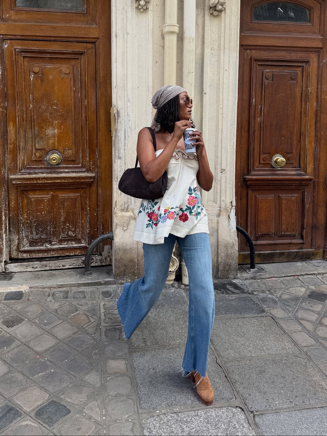Lena in jeans and embroidered top