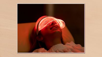 Image of a woman using a red light therapy device in a white frame against a beige watercolour-style background